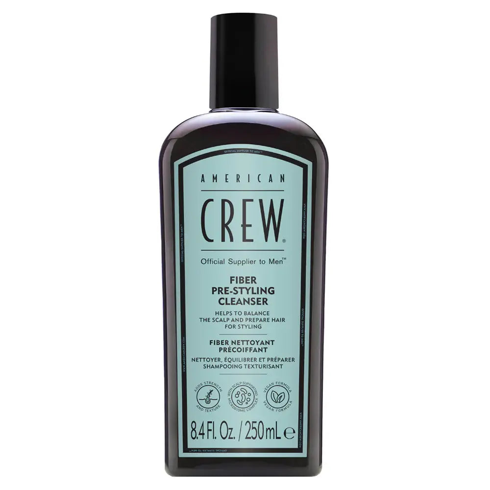 Bottle of American Crew fiber pre-styling cleanser on a white background