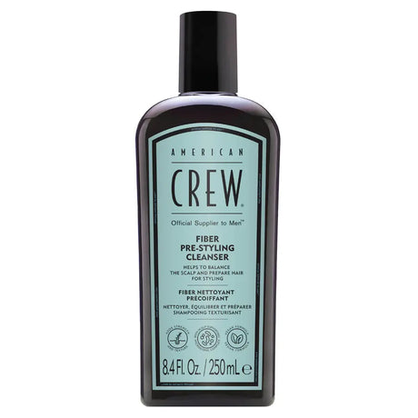 Bottle of American Crew fiber pre-styling cleanser on a white background